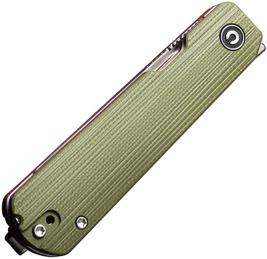 Green folding knife with textured handle on a white background