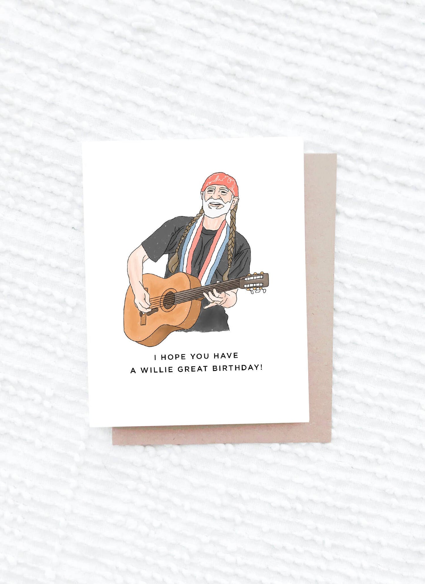 Greeting card with illustration of a man playing guitar and text on a white background