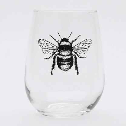 Clear glass with a black bee illustration on a white background