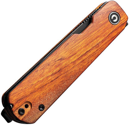 Wooden folding knife on a white background