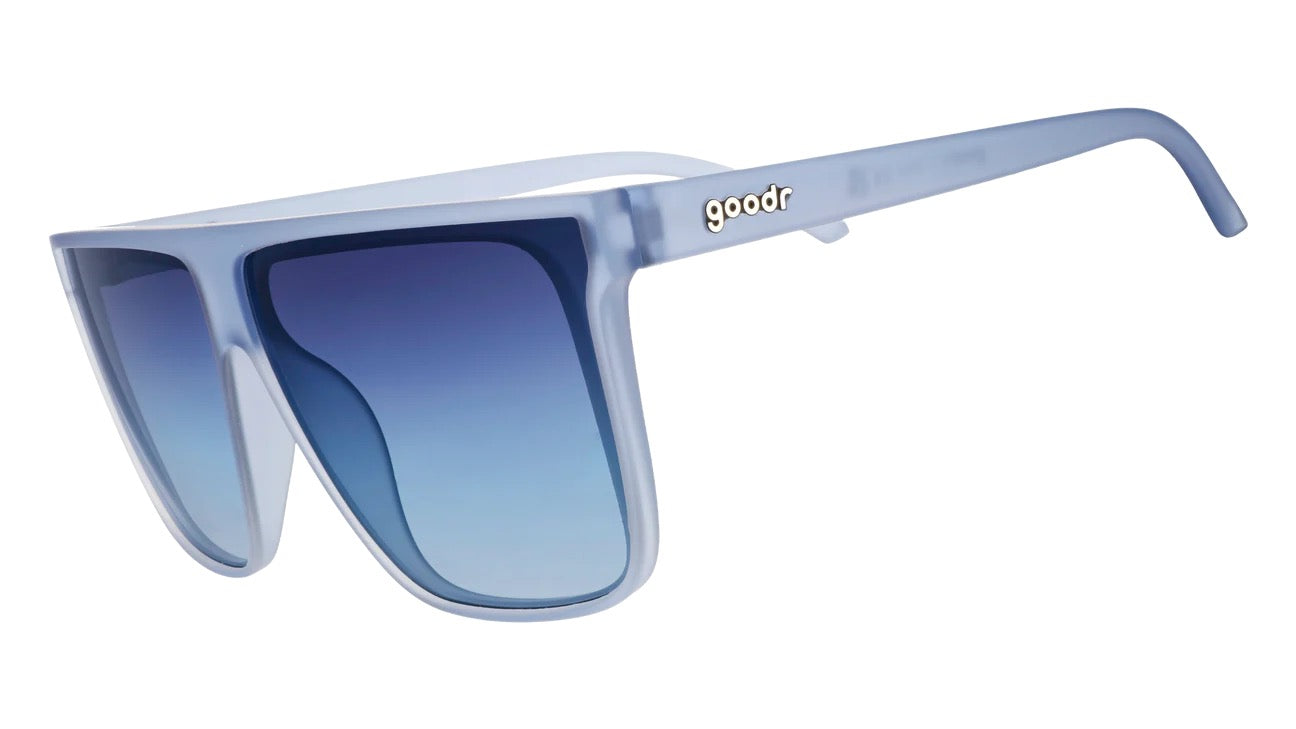 Blue sunglasses with gradient lenses on a white background
