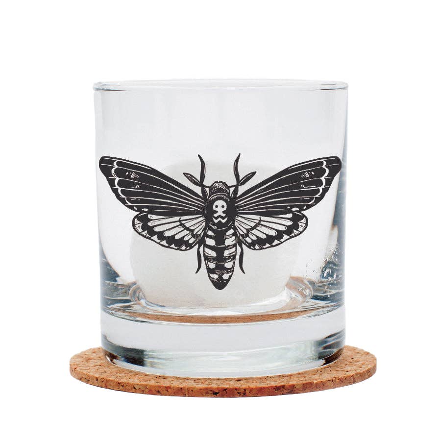 Clear glass with black butterfly design on a white background